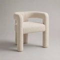 Fauteuil en tissu bouclé beige avec accoudoirs arrondis 75 x 75 x 75 cm